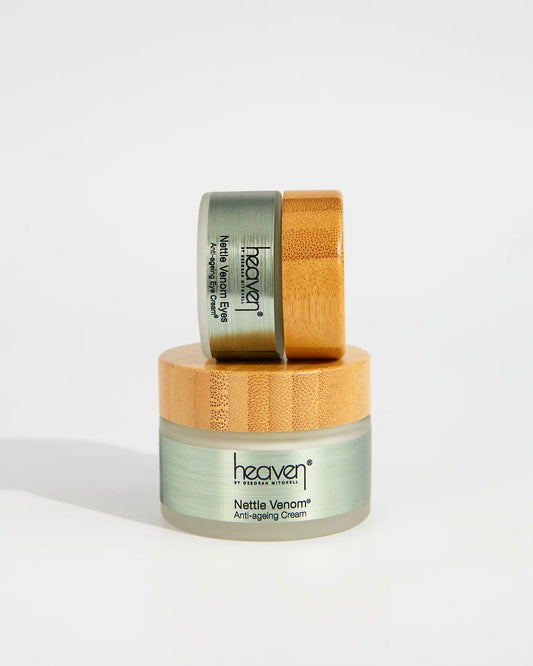 Two Skincare jars with bamboo lid on a white background