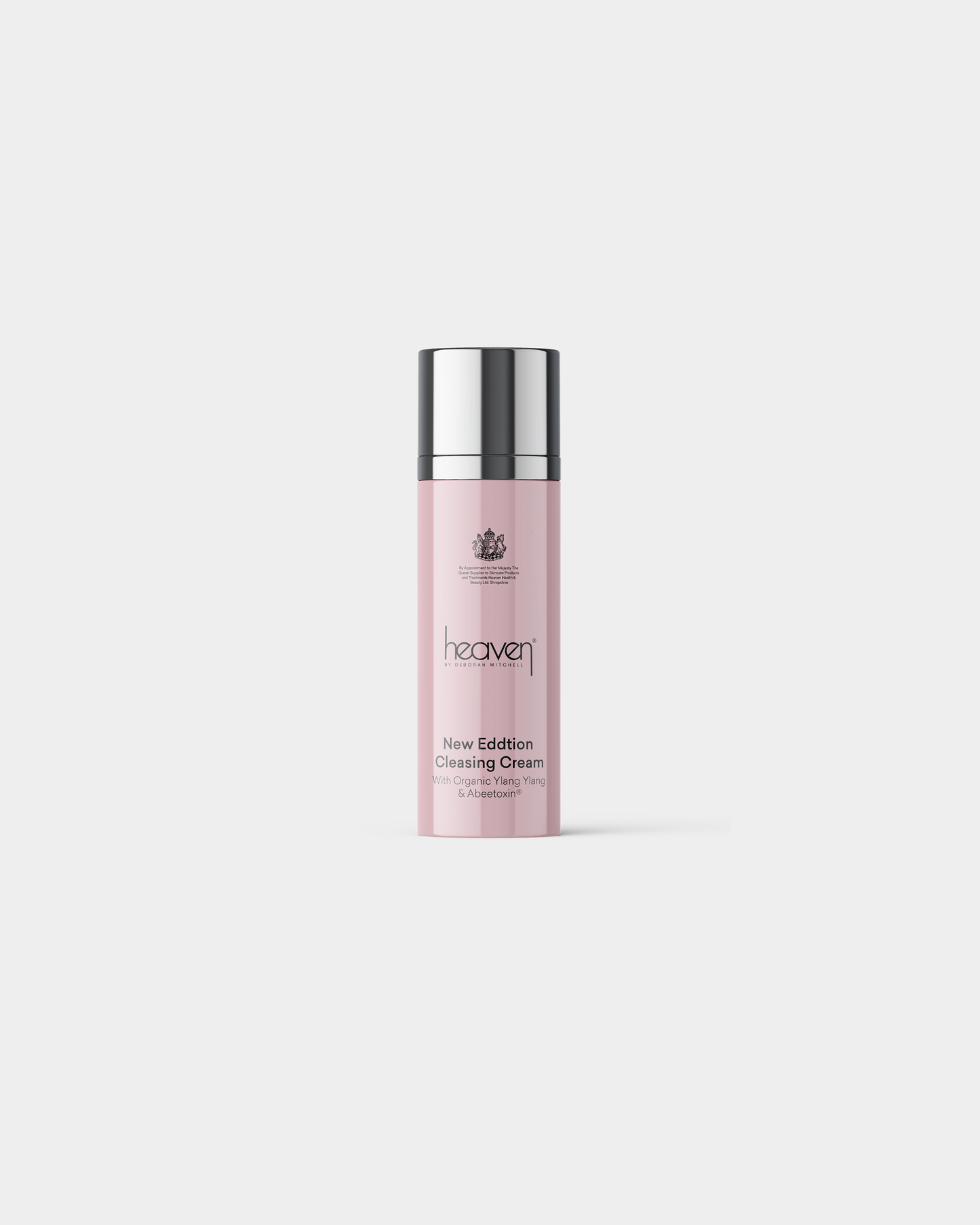 Heaven New Edition Cleansing Cream in a tall, light pink bottle with a silver cap.