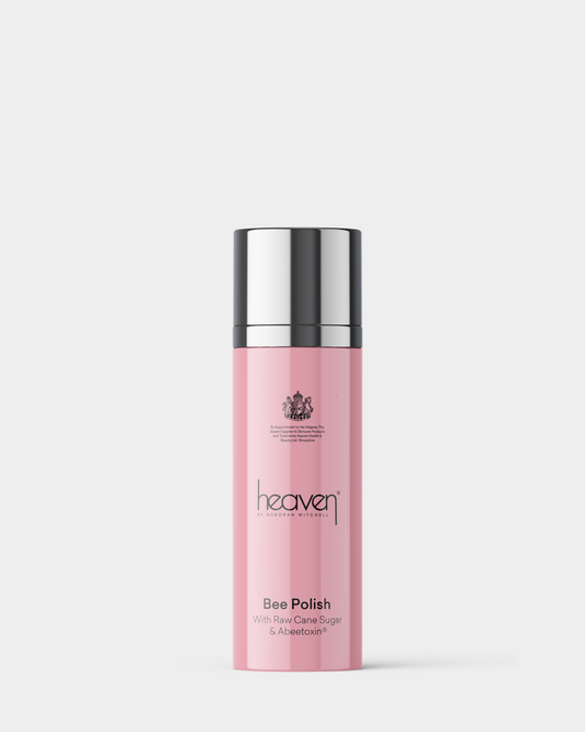 Pink bottle with silver cap on a white background