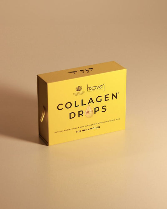 Box of heaven Collagen Drops on a beige background