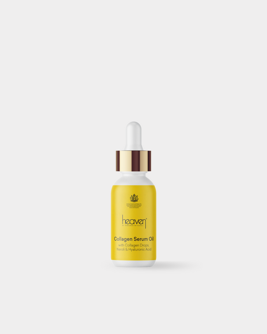 Yellow Collagen Serum Oil in pipette bottle. On a white background.