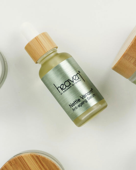 Bottle of heaven by Deborah Mitchell Nettle Venom Anti-aging Serum on a white background