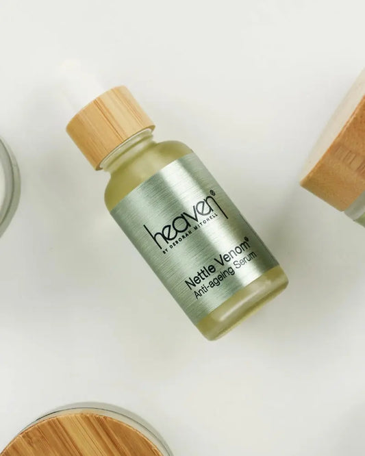 Bottle of heaven by Deborah Mitchell Nettle Venom Anti-aging Serum on a white background