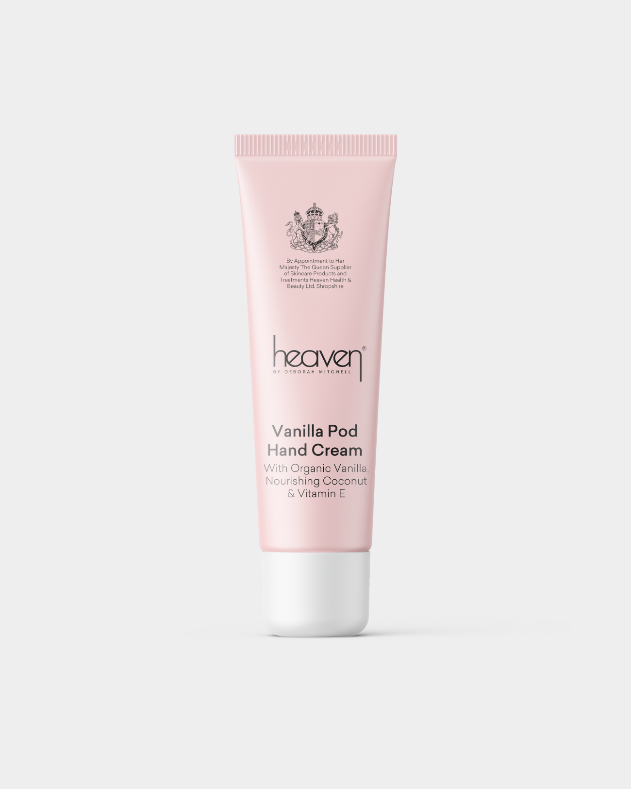 Pink tube of 'heaven' Vanilla Pod Hand Cream on a white background